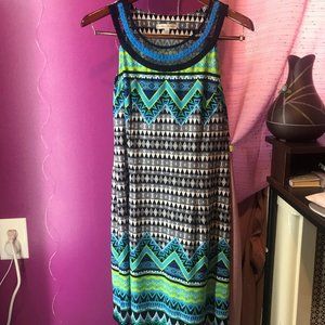 Woman's colorful peacock themed patterned vibrant sleeveless long dress